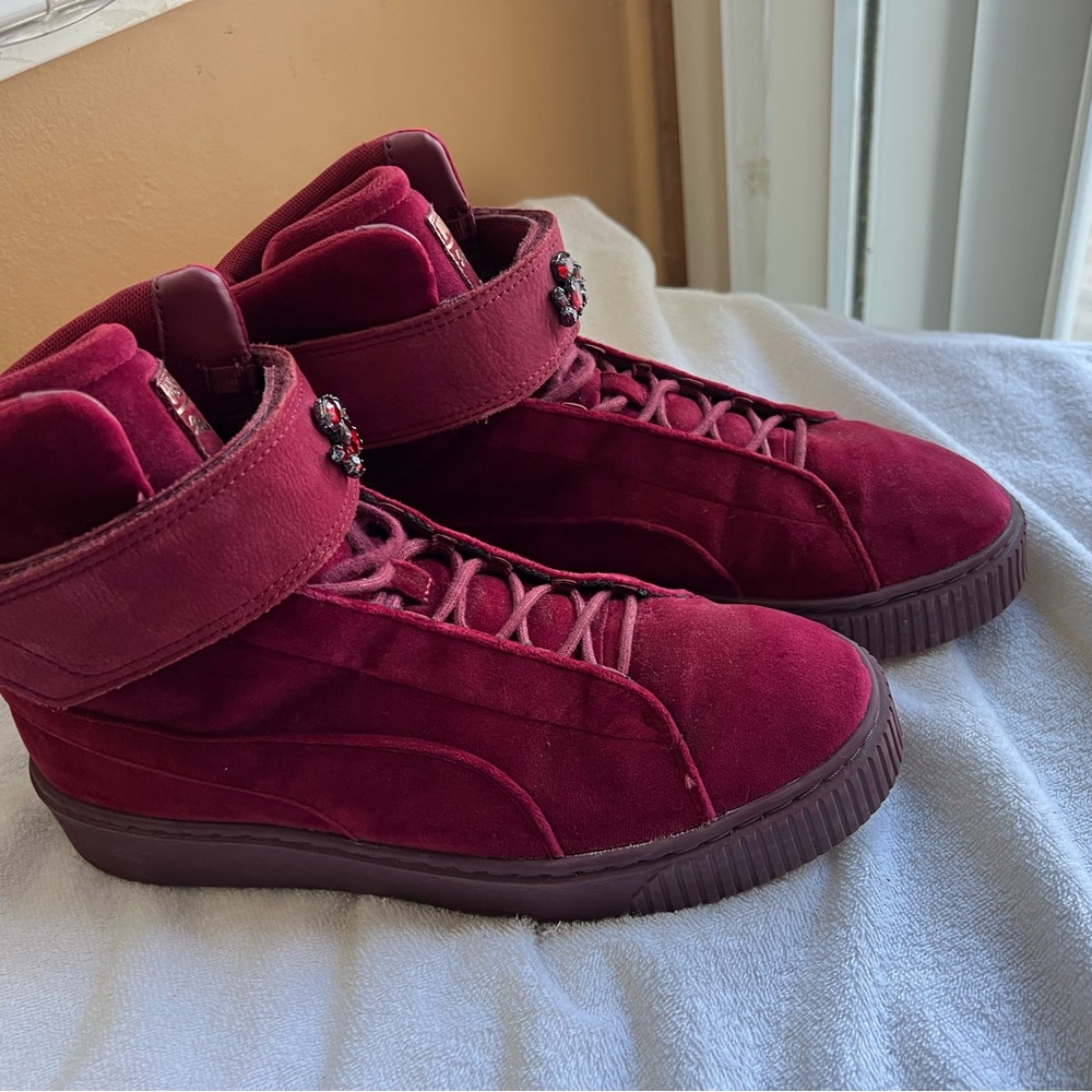 Maroon suede high top pumas